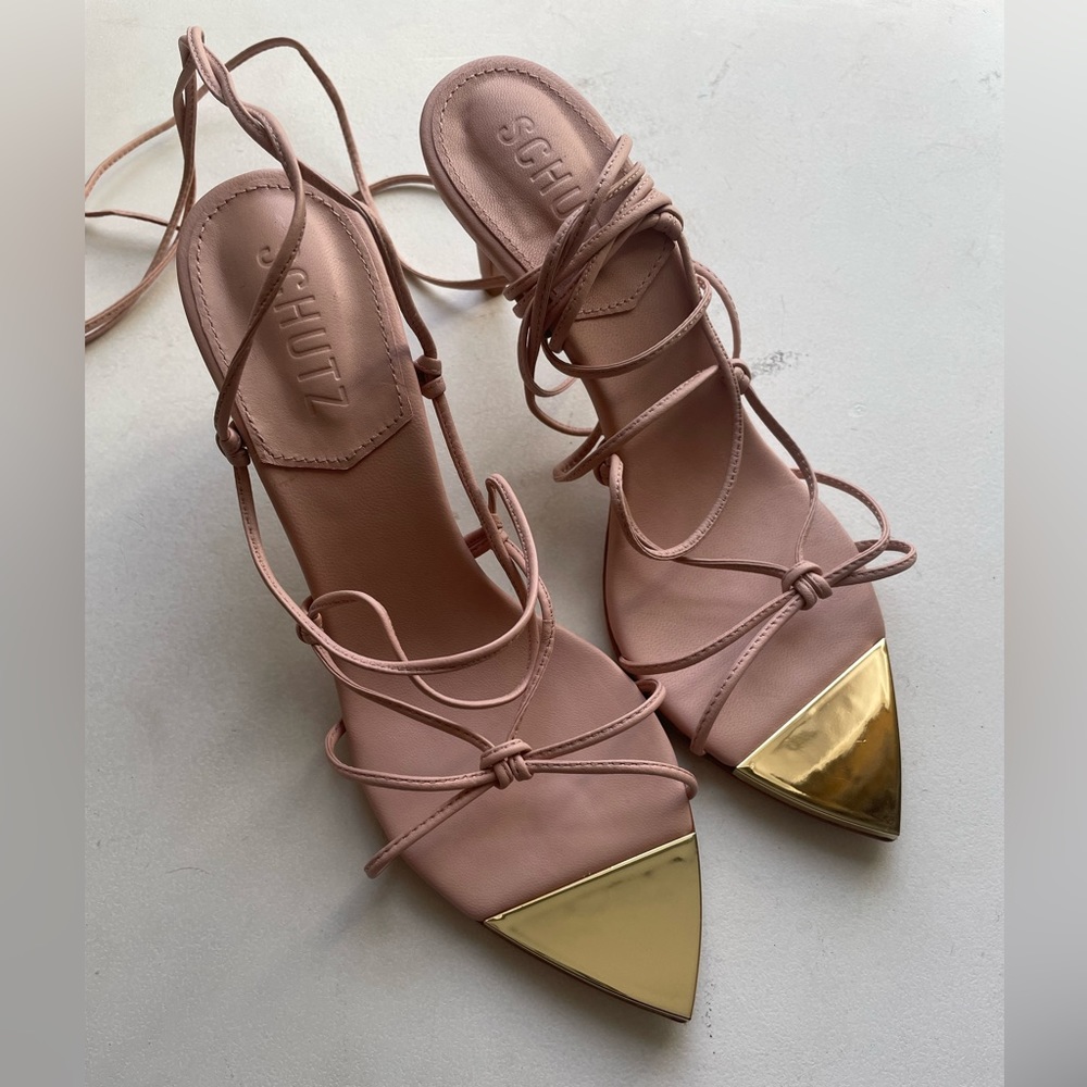 Brand new. Never worn. Color is pastel pink. Size 6.5.
